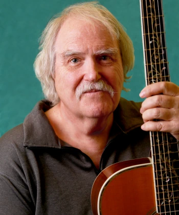 Portrait image of Douglas with Guitar